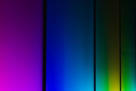 Colorful reflection of the lighting wall backgroundの写真素材