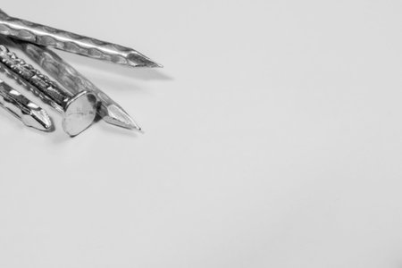 Metal nails isolated on white background