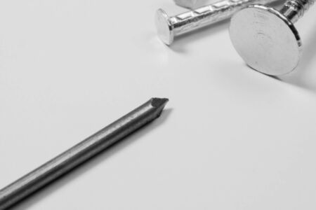 Metal nails isolated on white backgroundの写真素材