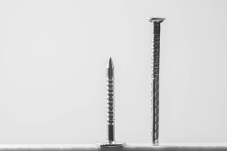 Metal nail isolated on white backgroundの写真素材