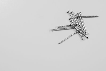 Metal nails isolated on white background