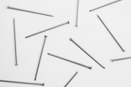 Metal nails isolated on white backgroundの写真素材