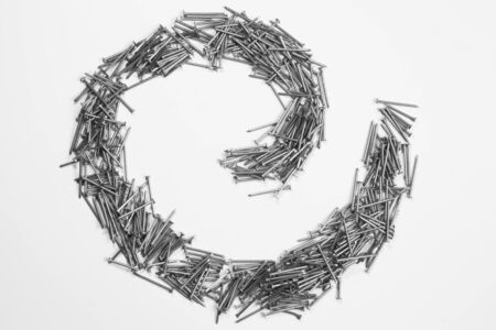 Metal nails isolated on white backgroundの写真素材