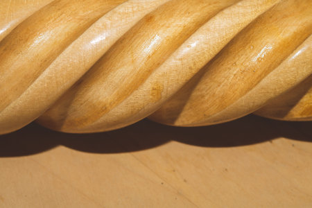 Wood carving. spiral decorating on the wooden leg