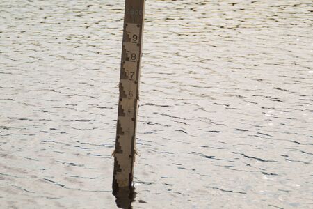Water depth gauge. measurement level of water. measuring scaleの写真素材