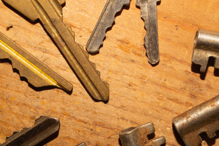 Different keys on wooden background. safety and security concept