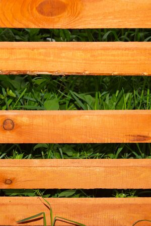 Wooden fence. nature background with brown wood planksの写真素材