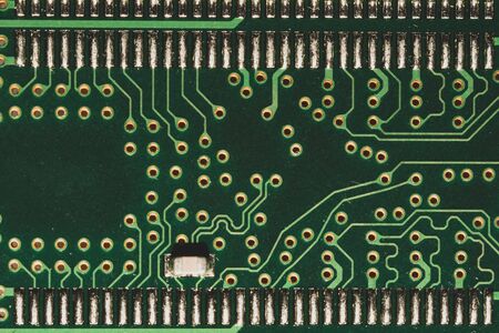 Electronic circuit board abstract background. computer motherboard close up. modern technologies. micro elements of computer with connections and traces. Intelligent technologyの写真素材