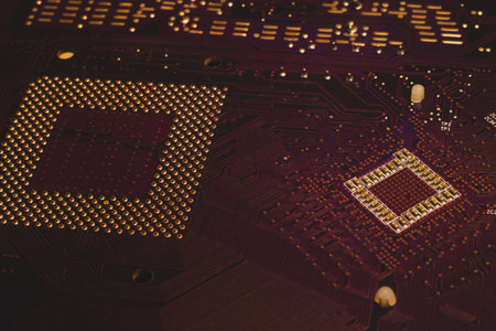 Processor pins macro. computer motherboard close up. cpu pins on a circuit board. micro elements of...