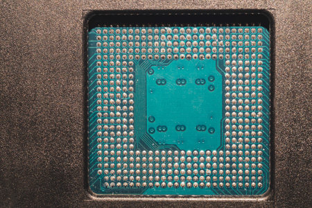 Processor pins macro. computer motherboard close up. cpu pins on a circuit board. micro elements of...