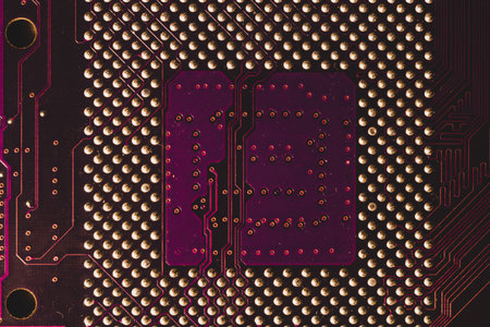 Processor pins macro. computer motherboard close up. cpu pins on a circuit board. micro elements of...