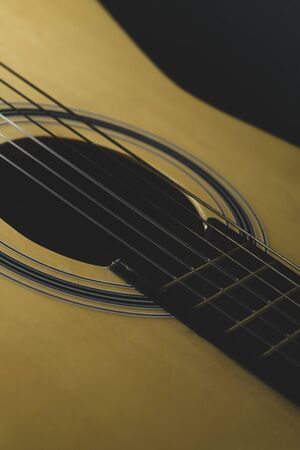 Acoustic guitar close up. musical instrument. strings on the guitar neckの写真素材