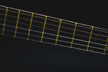 Acoustic guitar neck close up. guitar strings macro. musical instrument