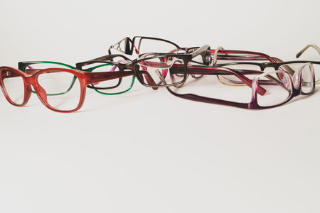 Glasses close up artistic shot. rimmed eyeglasses background with copy space. various reading...