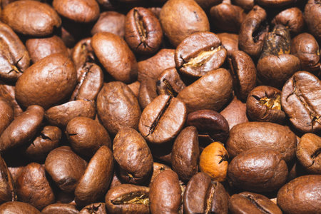 Coffee beans close up background. roasted coffee beans texture