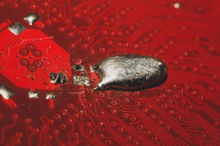 Spoiled motherboard close up. circuit board with dust and defects. modern technologies. micro elements of computer with connections and traces. Intelligent technology abstract backgroundの写真素材