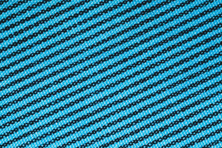 Turquoise textile background. blue fabric texture. piece of cloth close upの写真素材
