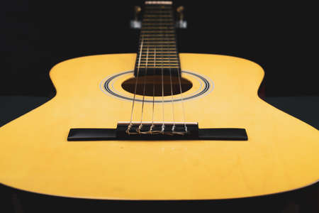 Acoustic guitar close up. musical instrument. strings on the guitar fretboardの写真素材