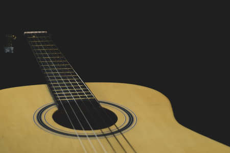 Acoustic guitar close up. musical instrument. strings on the guitar fretboardの写真素材