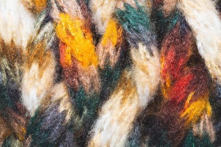 Colorful wool yarn. woolen fabric background. knitted textile close up