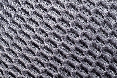 Black fabric texture close up. textile background. knitted pattern. woven material