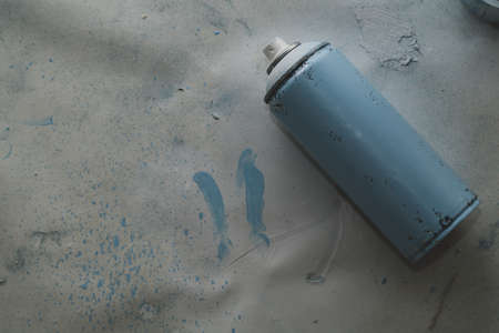 Spray paint can on dirty backgroundの写真素材