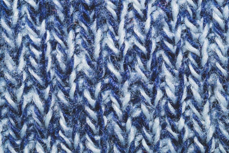 Blue knitted background. woolen texture. fibers pattern close upの写真素材
