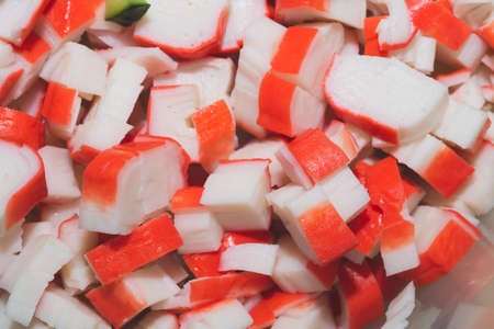 Chopped crab sticks close up background. Salad ingredientの写真素材