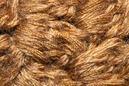 Knitted wool background close up. brown soft fabric