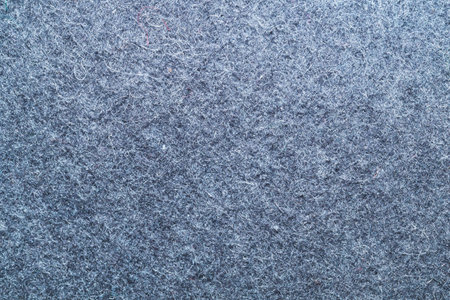 Gray fabric close up. textile background. cloth backdrop