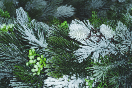 Artificial fir tree branches with needles close up. christmas decorationの写真素材