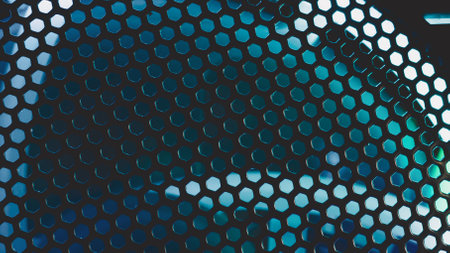 Detail of computer fan with blue color light abstract background. cooler grid close up. rgb led illuminationの写真素材