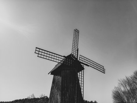 Old wooden windmill. rural building. black and whiteの写真素材
