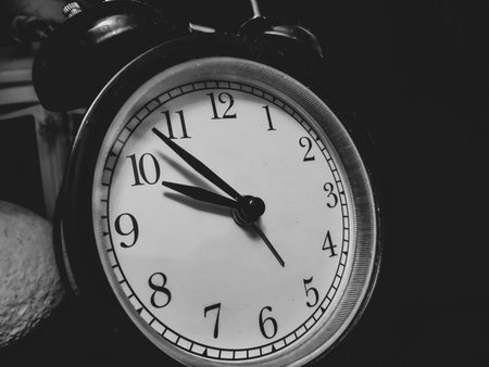 Retro black round alarm clock close upの写真素材