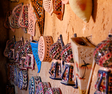 Arabian glazed pottery on a wallの写真素材