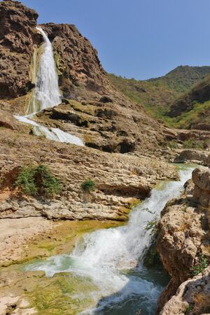 Wadi Dharbat Waterfalls from lower Canyonの写真素材