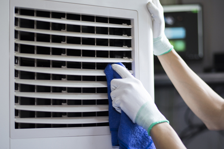 Take care of electrical appliances in the house, Cleaning air conditioner, Close-up.の写真素材