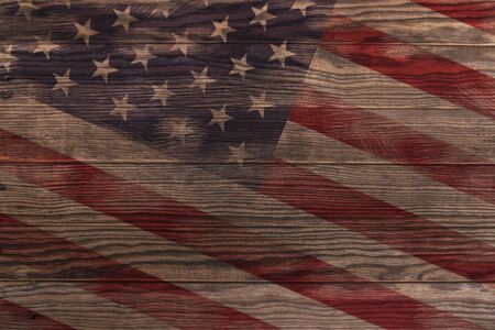American flag painted old wood texture, There are traces and stains, Feel about history.の写真素材