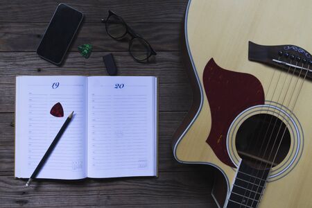 Composer's equipment is placed on wooden table, Close-up, Copy-space.の写真素材