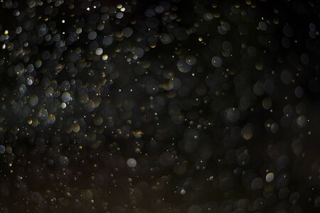 Dark silver bokeh, Photos caused by water droplets, Festival background.の写真素材