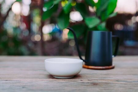 Country hot tea, Teacup placed on a wooden table, Close-upの写真素材