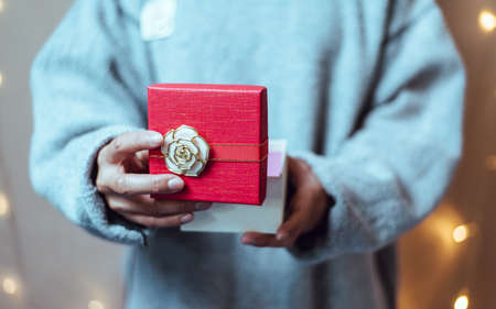 Big day gifts, People opening a gift, Close up.の写真素材
