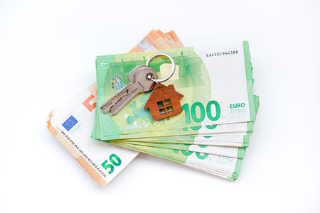 Real estate investing concept. Euro bills, cash or housing. Keysの写真素材