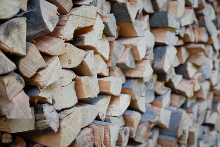 A stack of firewood for the winter in the villageの写真素材