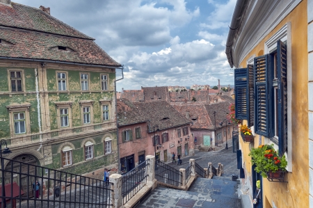 SIBIU, ROMANIA - JULY 16: The Small Square On July 16, 2013 In Sibiu, Romania. The buildings here date since the 14-16th centuries and used to house crafts workshops and town guilds.のeditorial素材