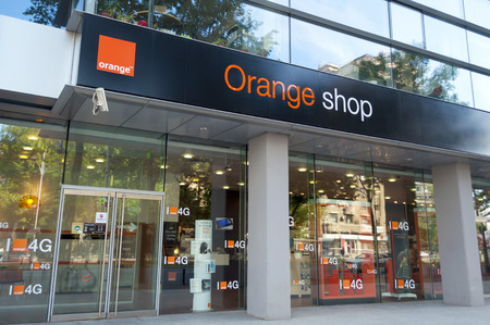 BUCHAREST, ROMANIA - May 18: Orange Shop on  May 18, 2014 in Bucharest, Romania.Orange  is a global provider for mobile phone, landline, Internet, mobile internet, and IP television services, with 226 million customersのeditorial素材