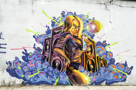 BUCHAREST, ROMANIA -JUNE 1, 2014: Anonymous graffiti image as seen on an alley wall in Bucharest on June 01,2014のeditorial素材