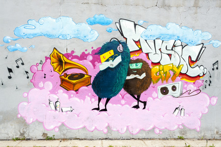 BUCHAREST, ROMANIA -JUNE 1, 2014: Anonymous graffiti image as seen on an alley wall in Bucharest on June 01,2014のeditorial素材