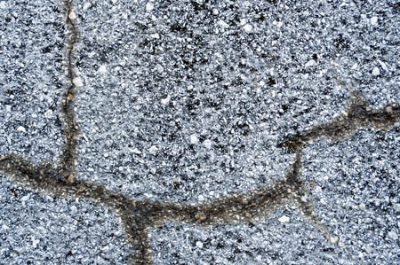 cracked stone wall background texture.の写真素材