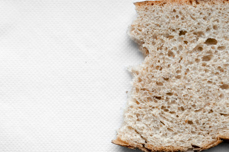 ripped bread on white background